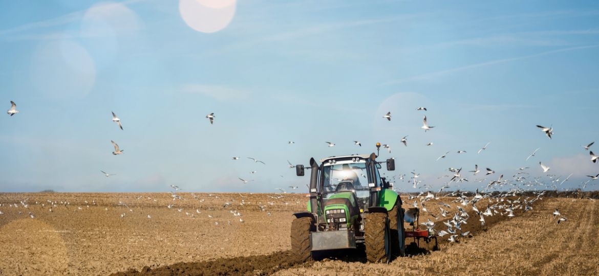 Tractor ploughing - Shutterstock image