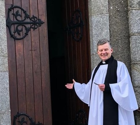 The Reverend Trevor Sargent opening the door of St Mary's church in Bunclody after his institution as Rector 1
