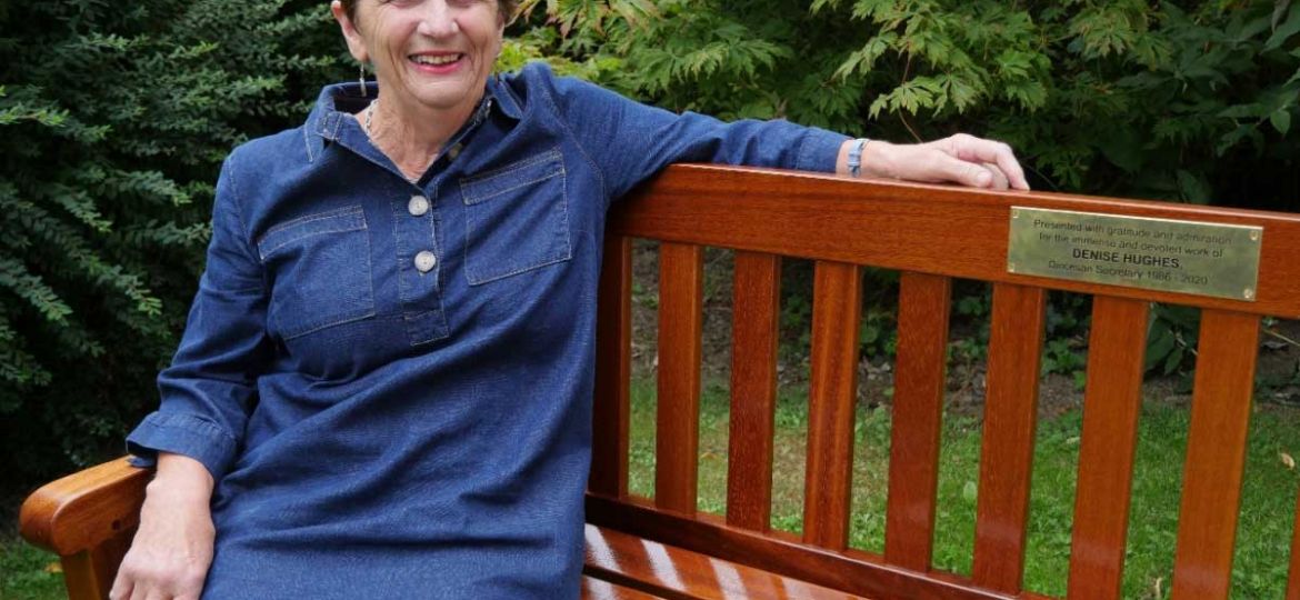 Denise-Hughes-sitting-on-bench-dedicated-to-her-for-long-servcie-to-the-Diocese-1